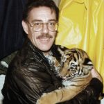 Jason holding Carmelita tiger.